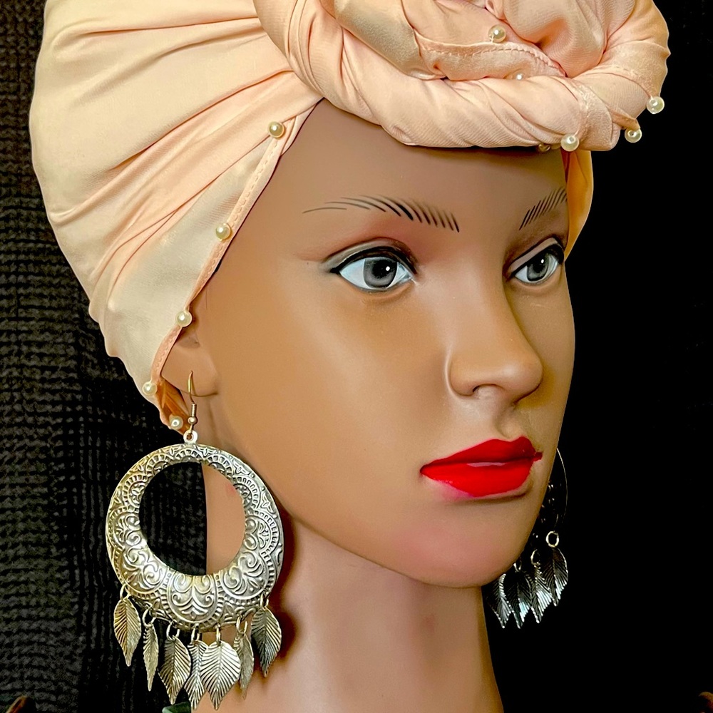 Brand new silver colored dangle hoop earrings